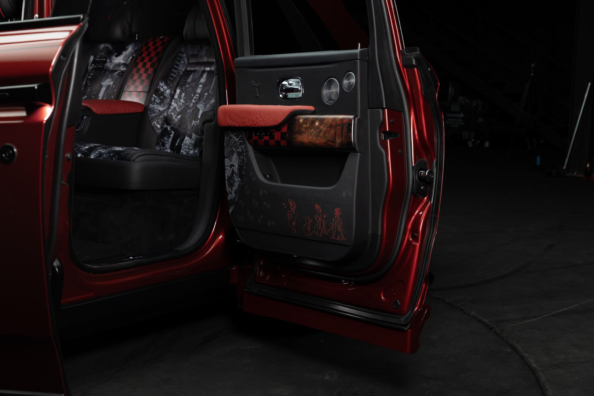 Joker Theme rear door open showing the embroidered door card and artwork seats