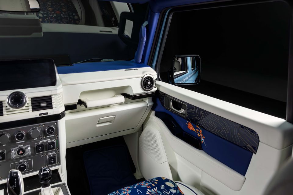 Record car: open door and dashboard with blue-and-white trim