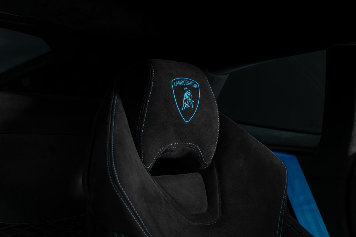 Headrest with laser-engraved emblem