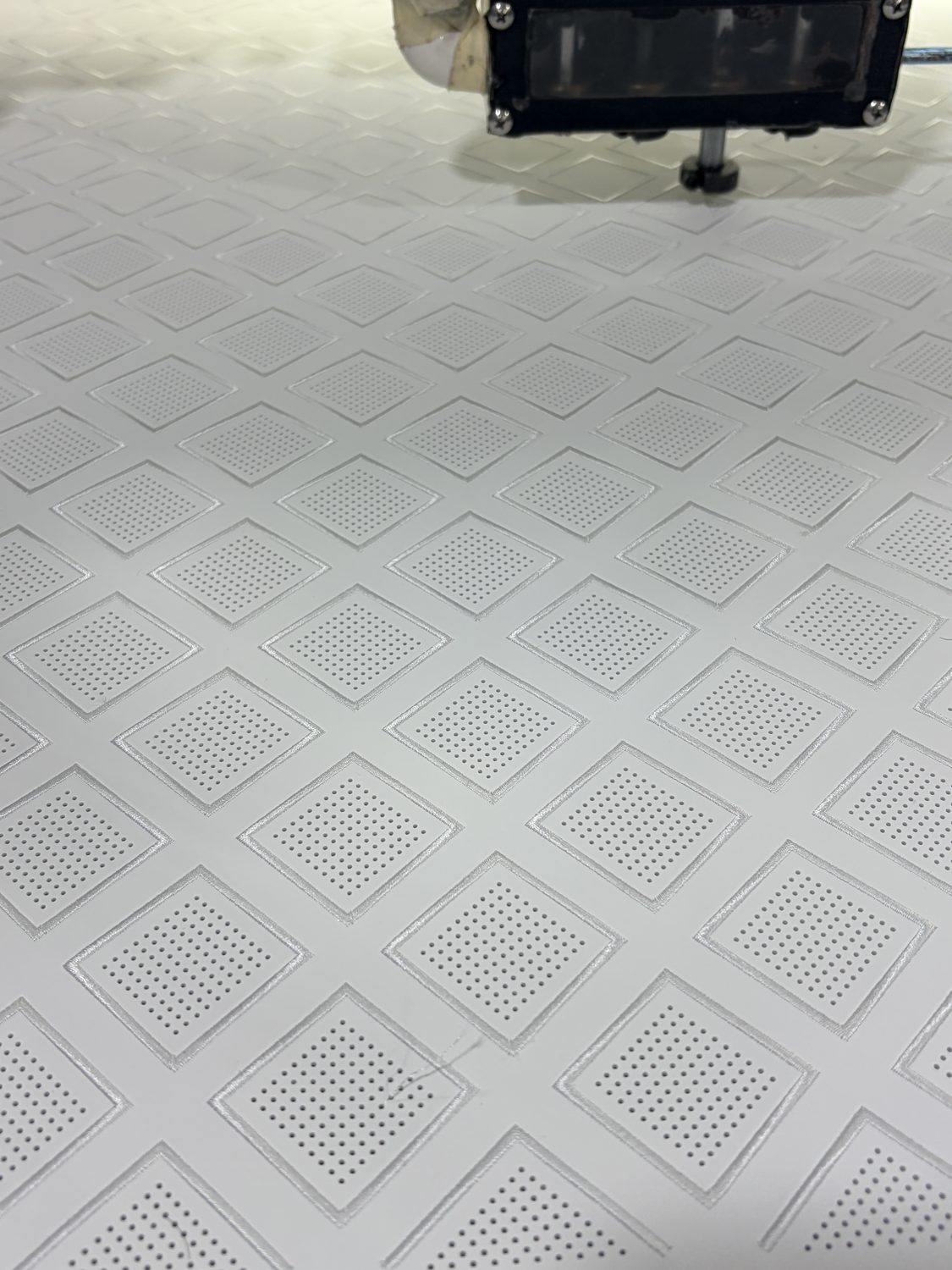 Diamond perforation pattern being produced on the machine