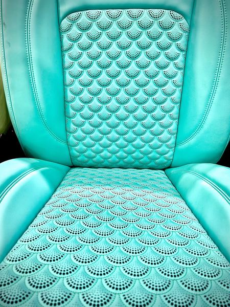 Teal seat with scale-pattern quilting