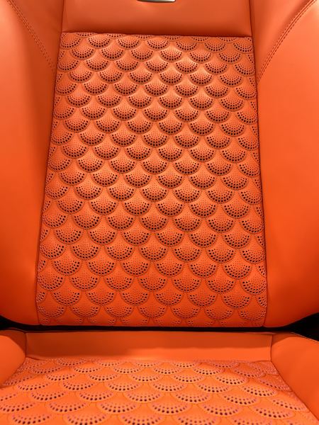 Orange backrest with scale quilting