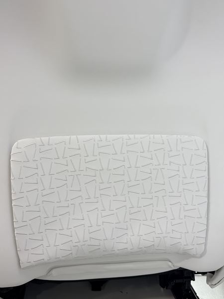 Textured quilted cushion in white