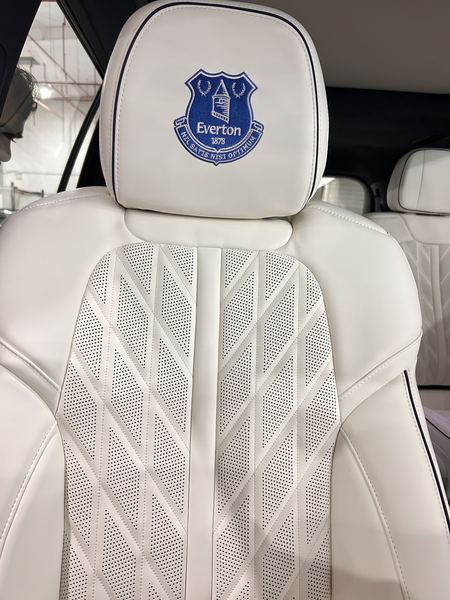 White seat with Everton crest on the headrest