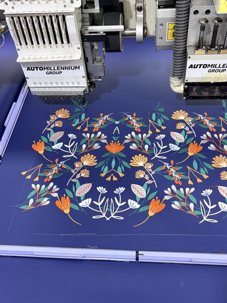 Floral embroidery panel on the machine