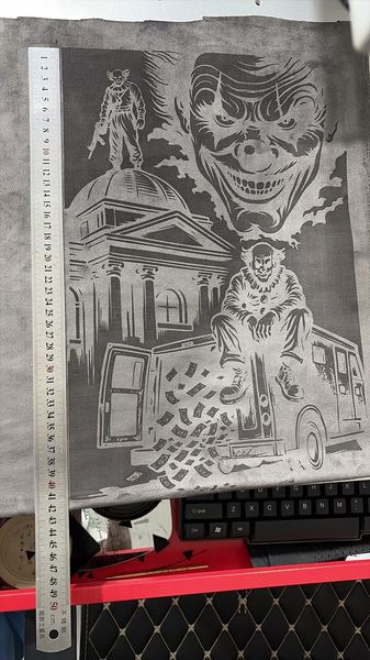 Laser-engraved Joker artwork on suede