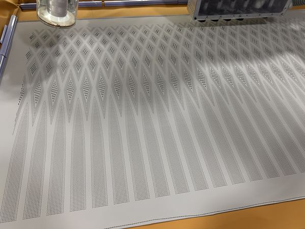 Perforation pattern on grey leather