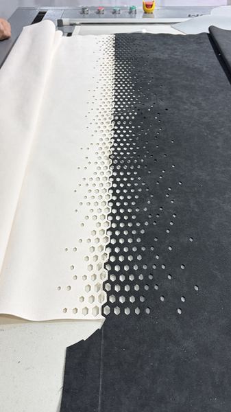 Gradient perforation on leather