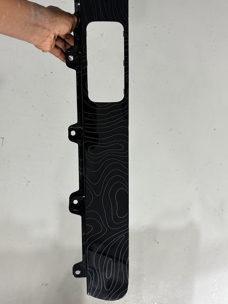Laser-engraved trim panel, full length