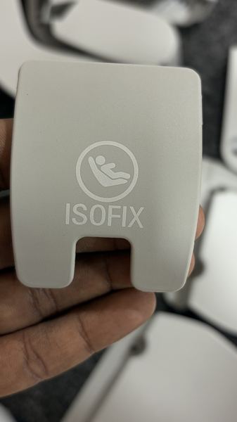 ISOFIX trim cover, laser-etched symbol